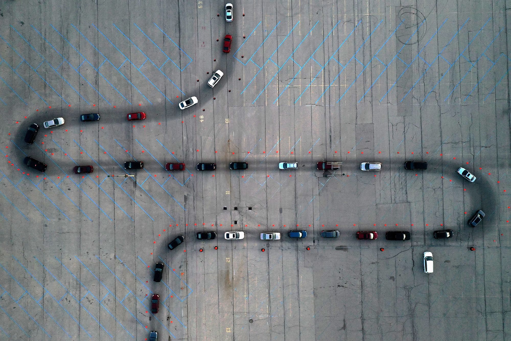 Vehicles line up at a drive-thru Covid-19 testing site in the parking lot of Miller Park in Milwaukee on Nov. 5.