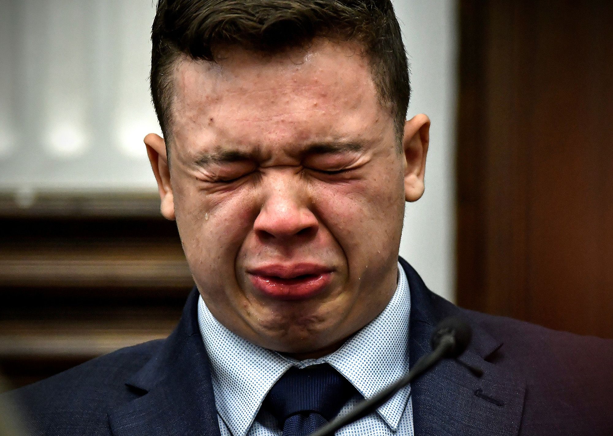 Kyle Rittenhouse breaks down on the stand as he testifies about his encounter with the late Joseph Rosenbaum during his trial at the Kenosha County Courthouse in Kenosha, Wis., on Nov. 10