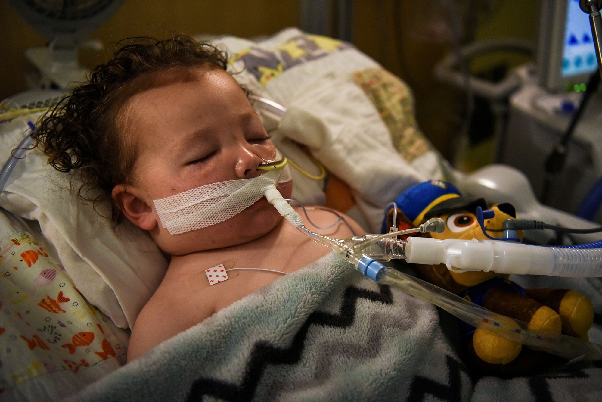 Adrian James, 2, who tested positive for Covid-19, breathes with the help of a ventilator at SSM Health Cardinal Glennon Children's Hospital in St. Louis, Mo., on Oct. 5.