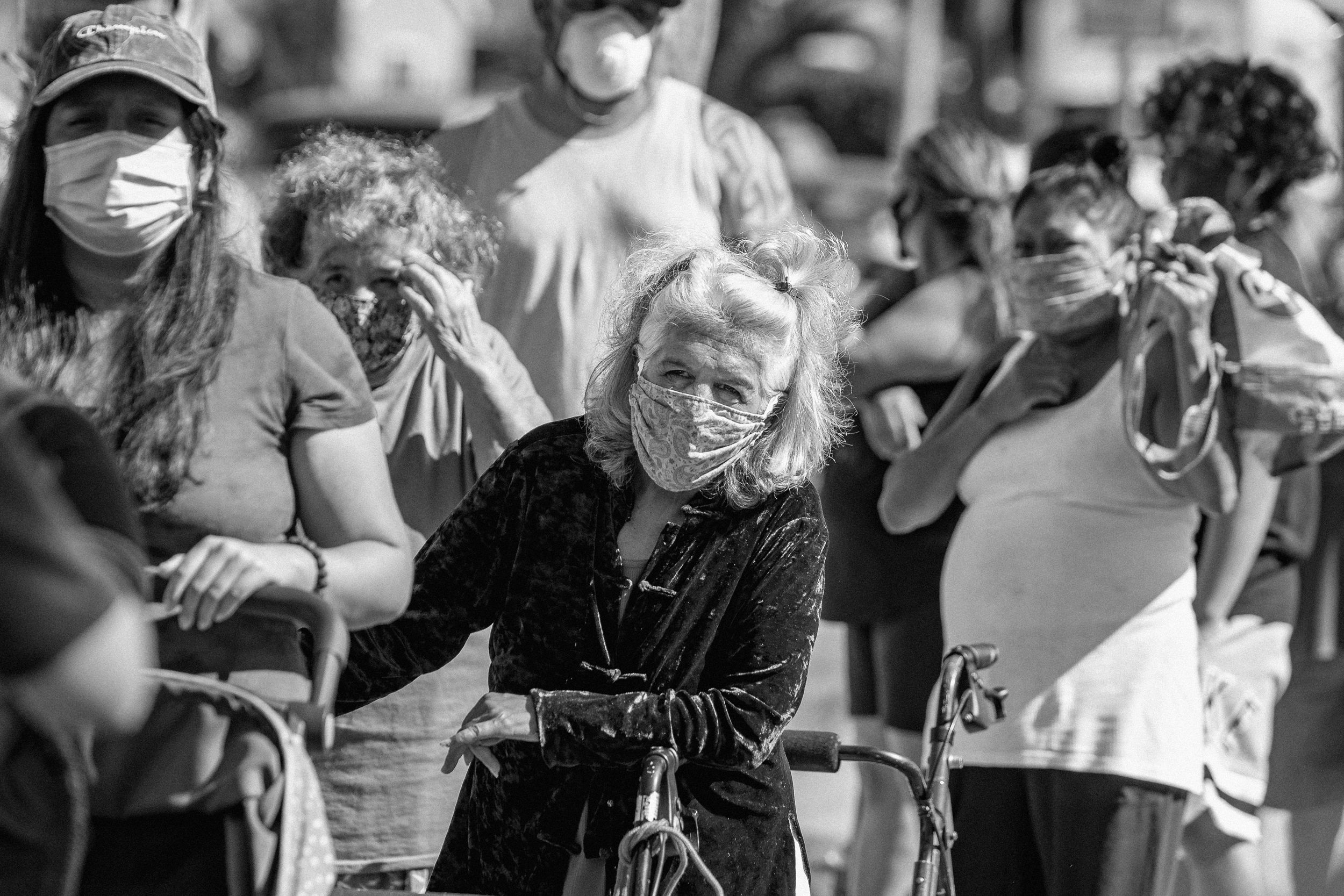 People line up at the Boys and Girls Club of Anaheim to receive free food in Calif., on July 14, 2020.