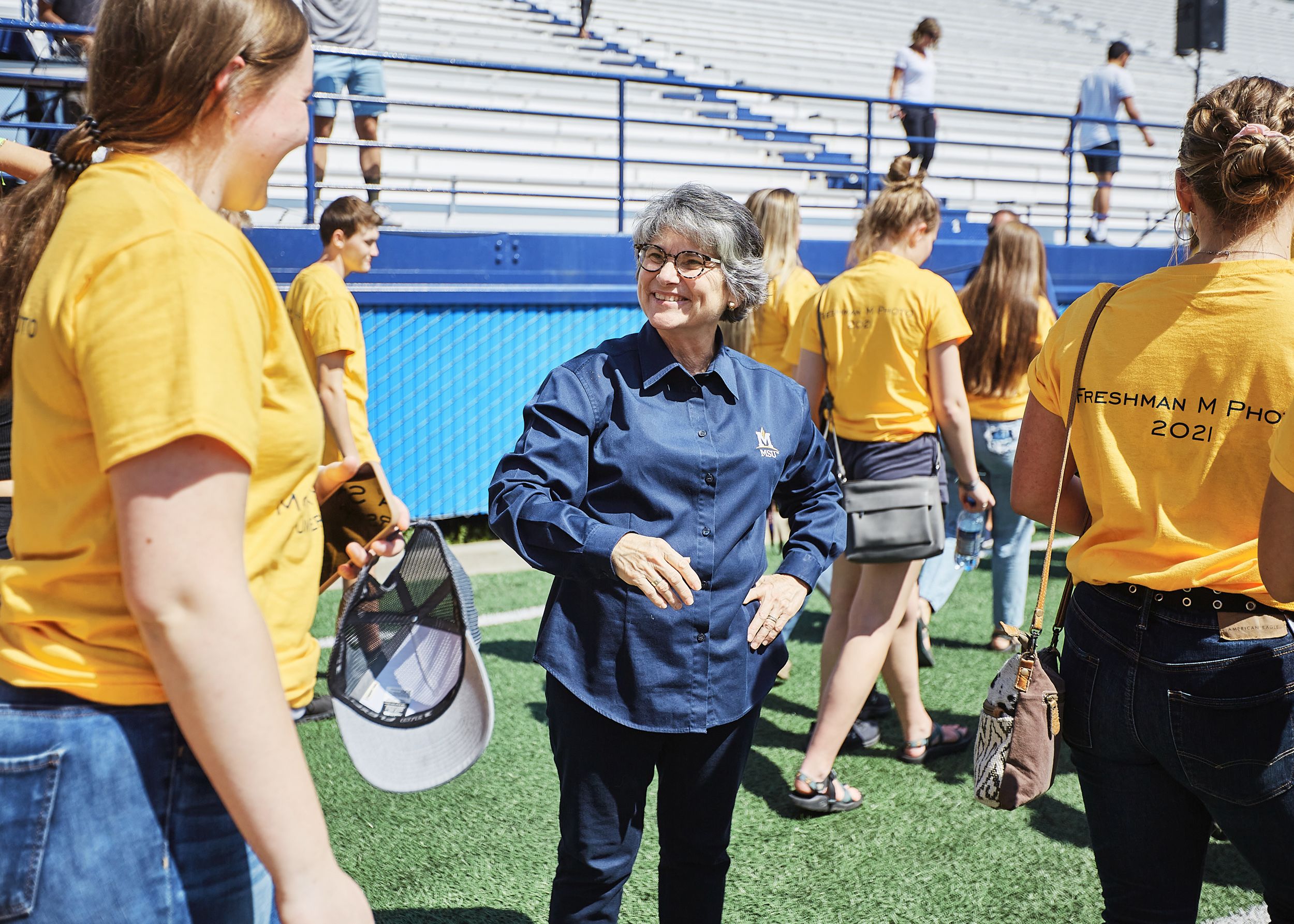 Waded Cruzado, the president of Montana State University, welcomes freshmen students at Bobcat Stadium on Aug. 24.