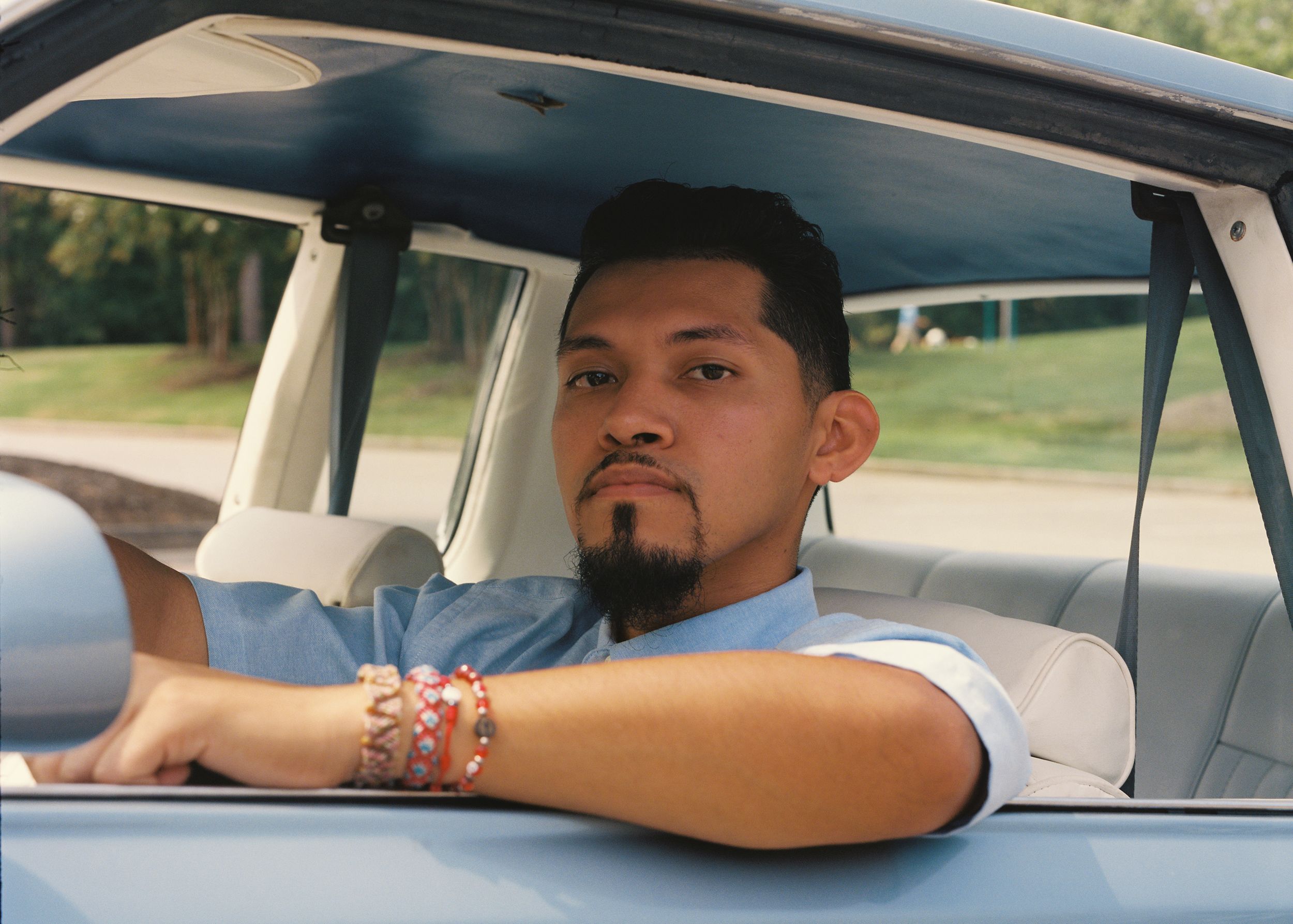 Alfredo Corona in his car at Rhodes Jordan Park in Lawrenceville, Ga., on Sept 10. (Piera Moore for NBC News)