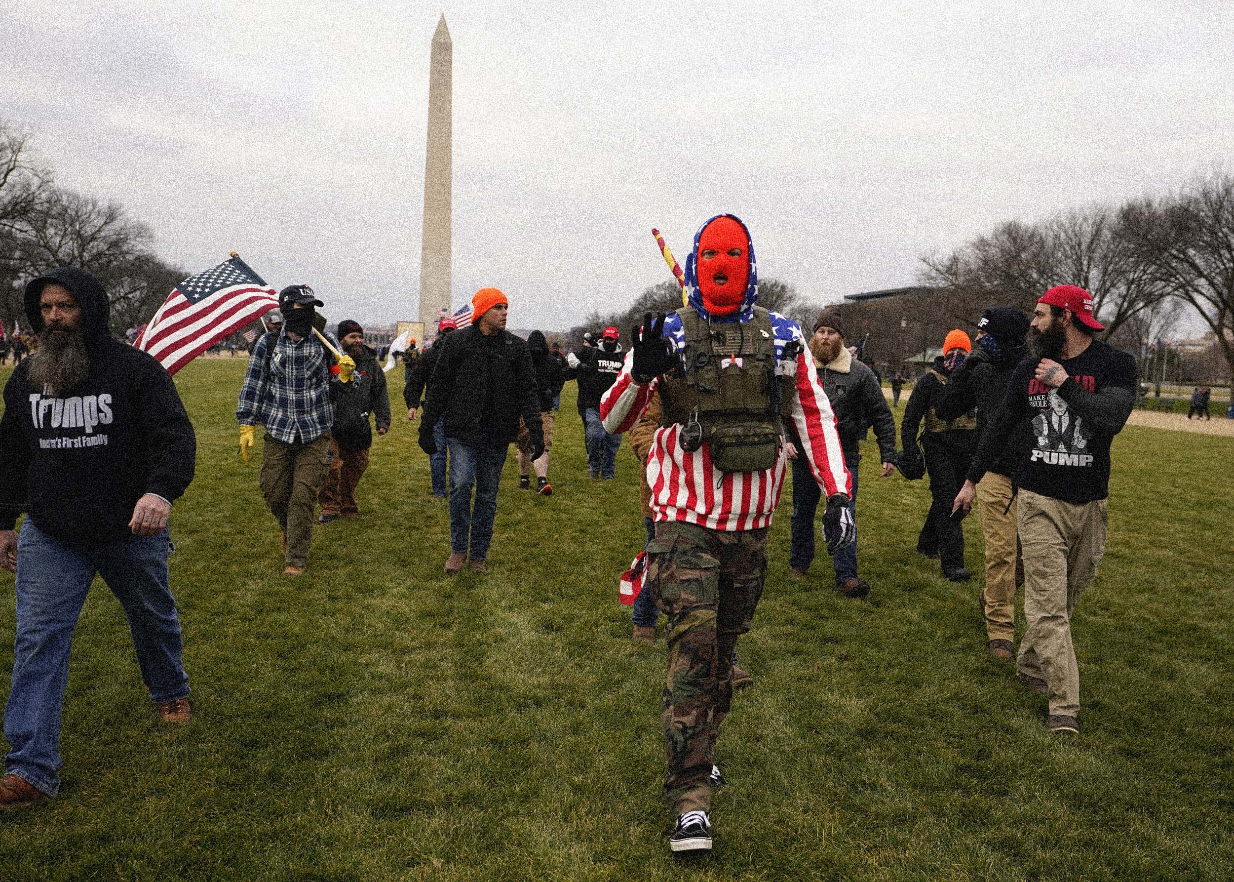 Protesters who identified themselves as members of the Proud Boys march in support of then-President Donald Trump. (Carolyn Kaster / AP file)