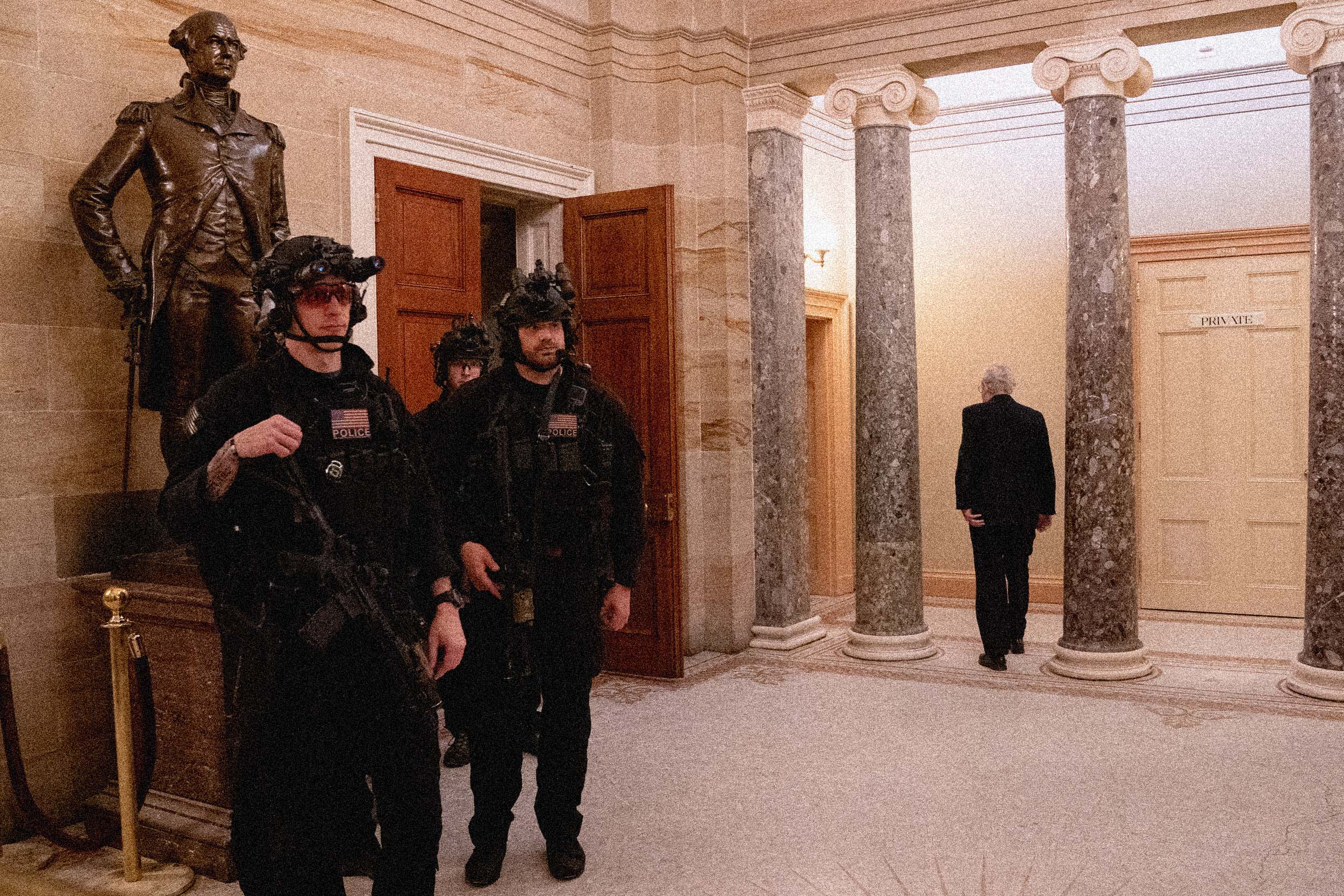 Then-Senate Majority Leader Mitch McConnell walks through the Captiol after resuming the electoral college vote certification. (Erin Scott / Bloomberg via Getty Images file)