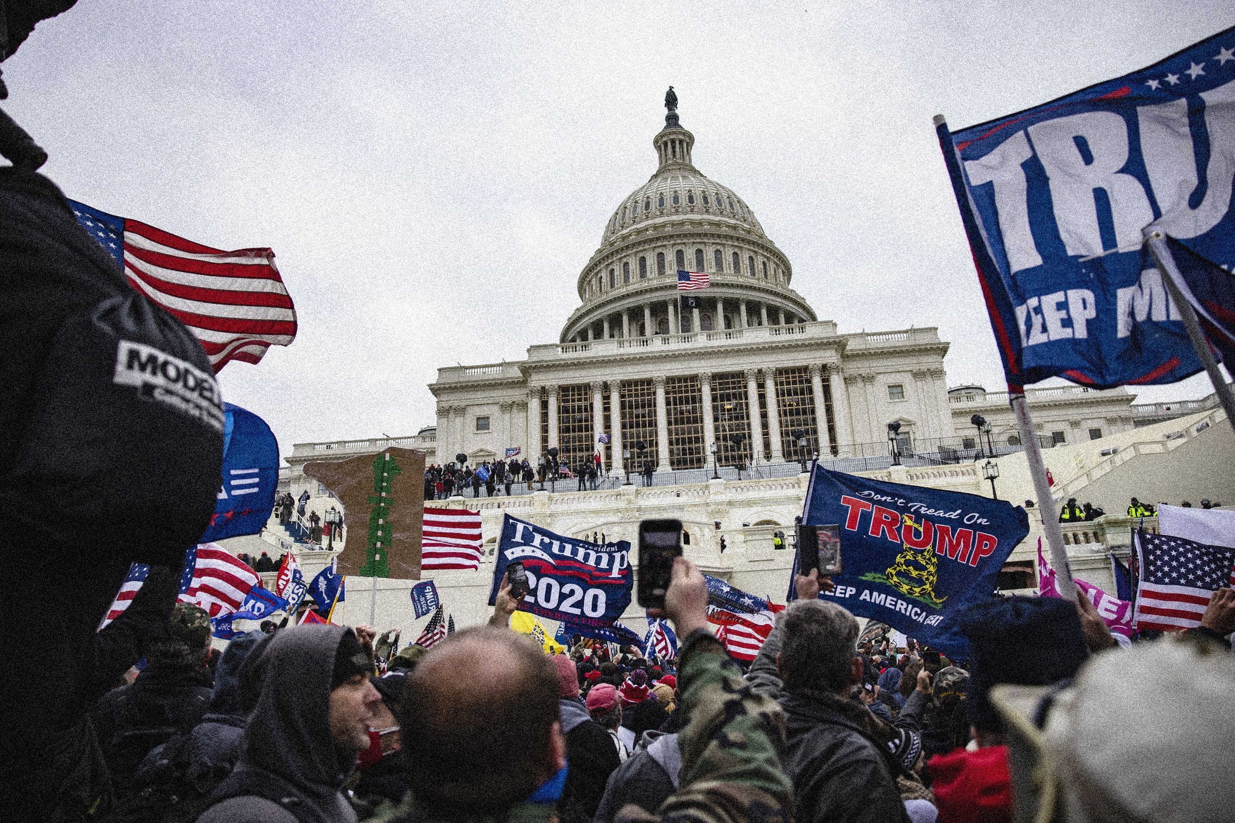 Pro-Trump supporters storm the Capitol on Jan. 6, 2021. (Samuel Corum / Getty Images file)