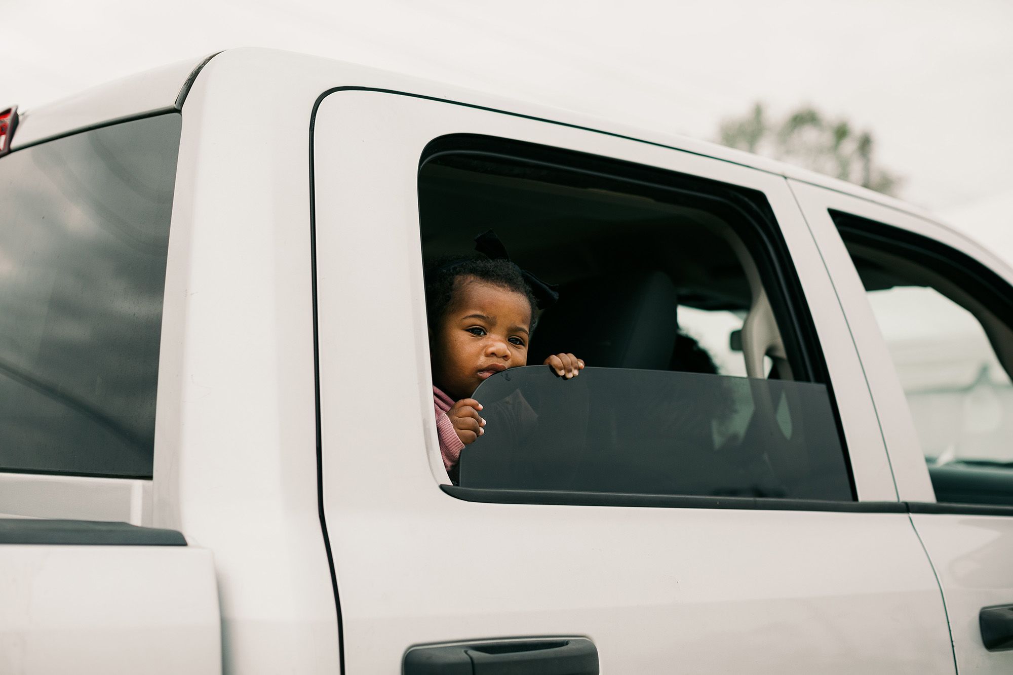 A young child in line at the hurricane relief center in Lake Charles. (Bryan Tarnowski for NBC News)