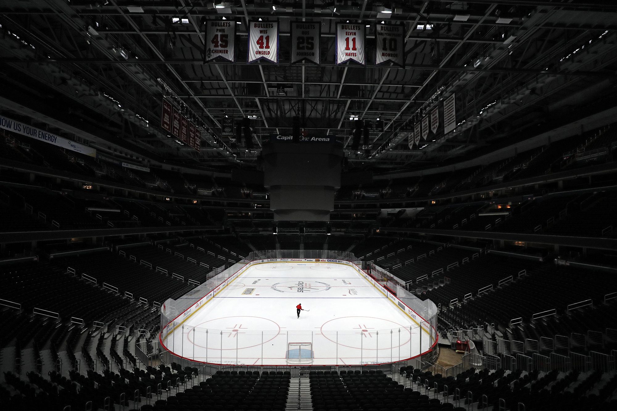 A lone skater on the ice prior to a Washington Capitals game against the Detroit Red Wings at Capital One Arena. (Patrick Smith / Getty Images)